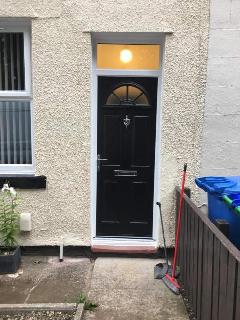 Composite and uPVC door installation