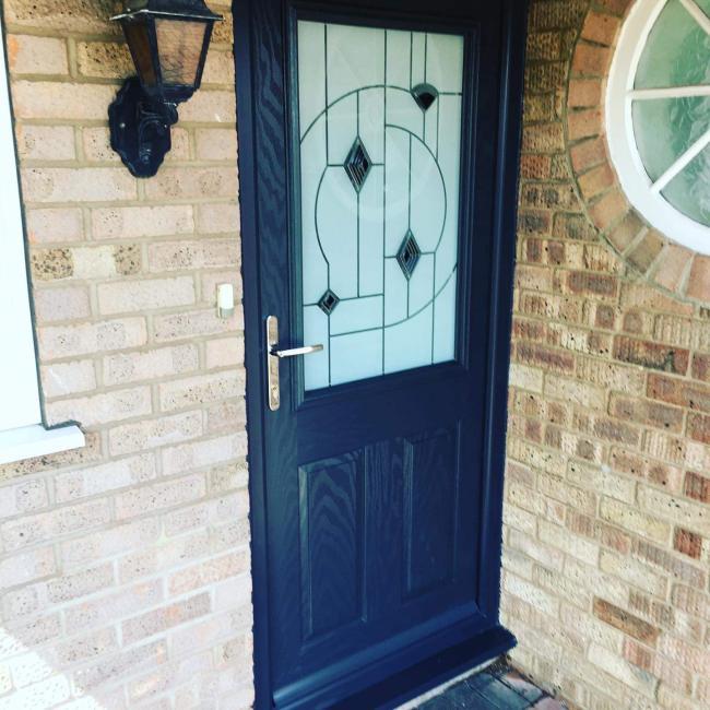 Composite and uPVC door installation