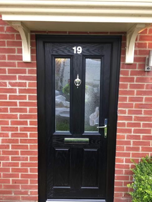 Composite and uPVC door installation