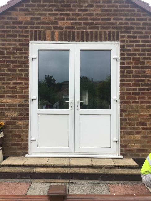 Composite and uPVC door installation