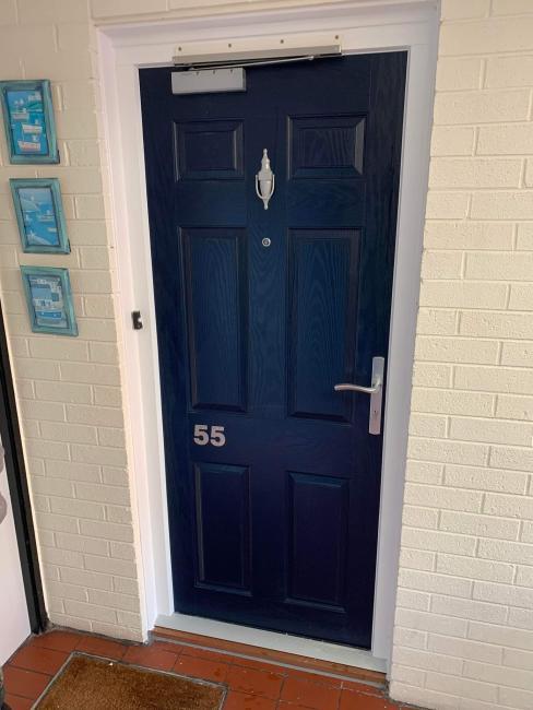 Composite and uPVC door installation