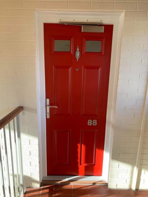 Composite and uPVC door installation